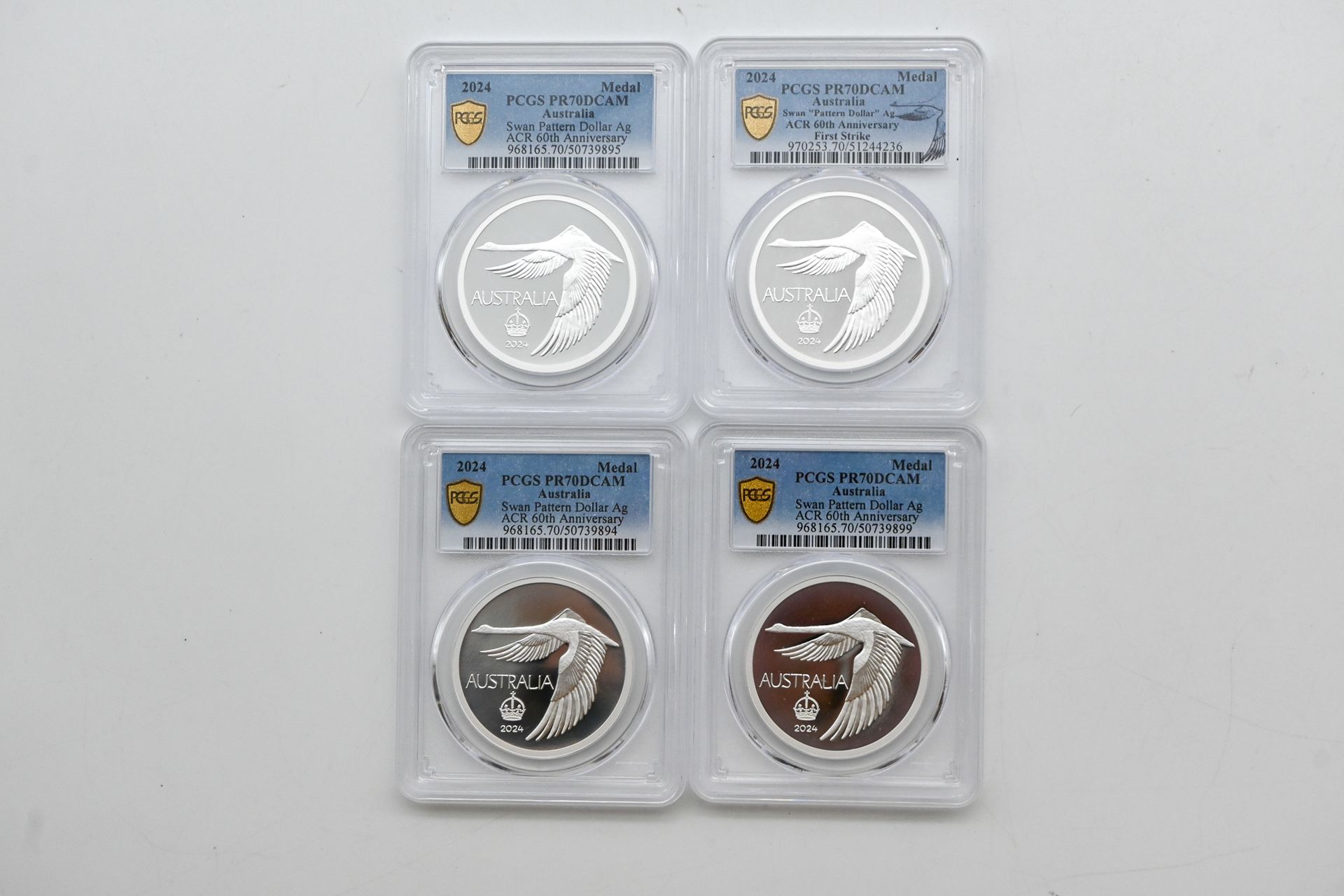 Lot 1214 — 2024 ACR 'Swan Dollar' Silver Medals, PCGS PR70DCAM. Top Pop. Sold $1,434
