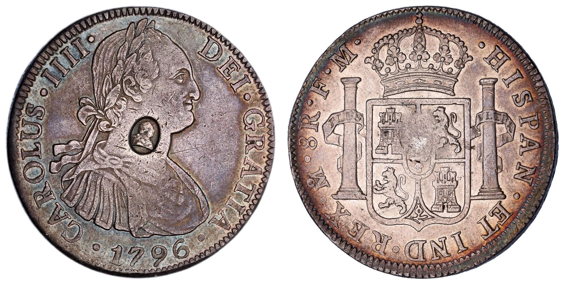 British countermarked dollar showing the oval George III countermark on a 1796 Mexico 8 reales, obverse and reverse, Lot 929 at Copeland Roberts Auction 021