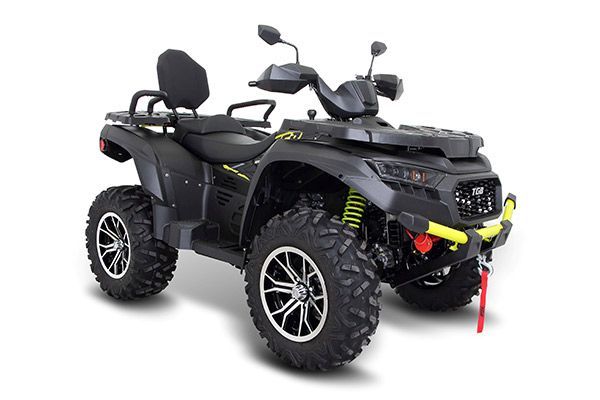 A black ATV is sitting on a white surface— MPE Adventure Quads & Bikes In Gloucester, NSW