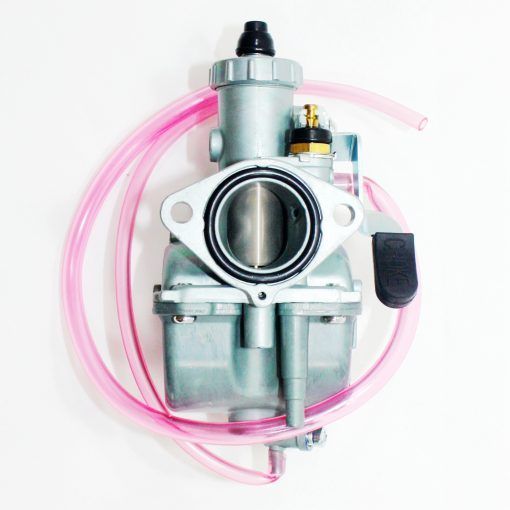 A Silver Carburetor With Pink Fuel Lines, Used for Fuel Mixing in an Engine — MPE Adventure Quads & Bikes In Thornton, NSW