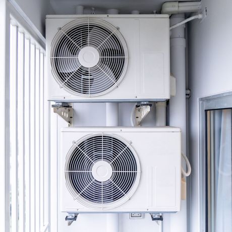 Ductless HVAC installation with stacked mini-split systems by Alex HVAC Service LLC