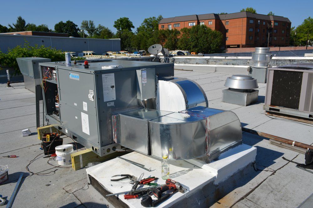 Daikin commercial HVAC installation on rooftop by Alex HVAC Service LLC