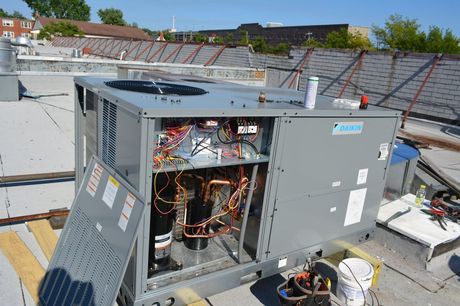 Commercial HVAC installation with Daikin rooftop unit by Alex HVAC Service LLC