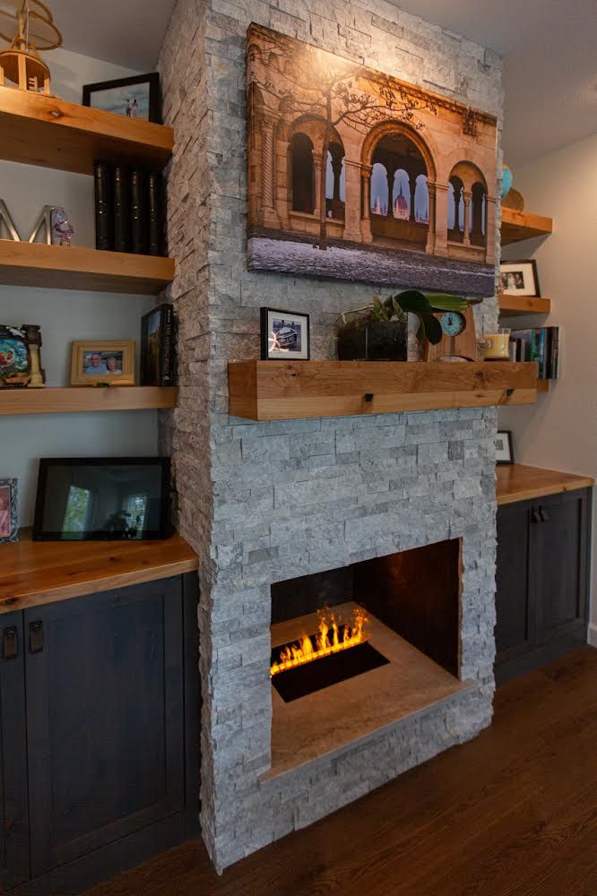 There is a fireplace in the middle of the room.