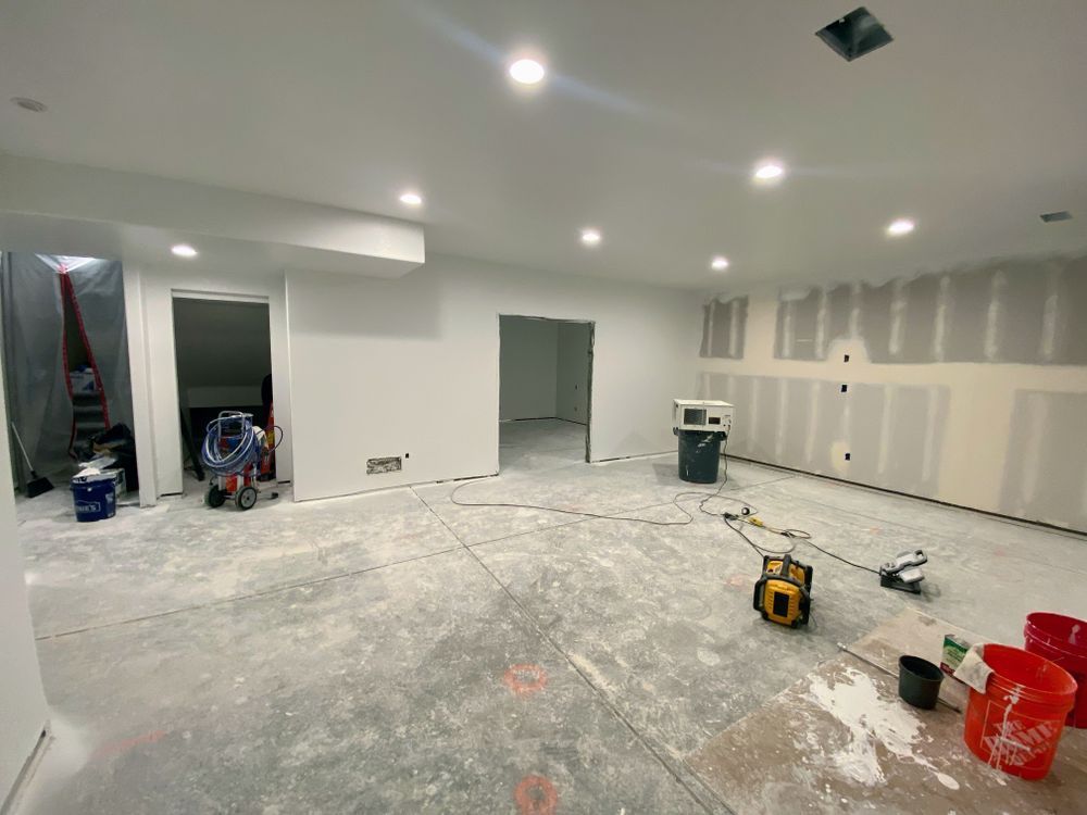A room that is being remodeled with a lot of tools on the floor.