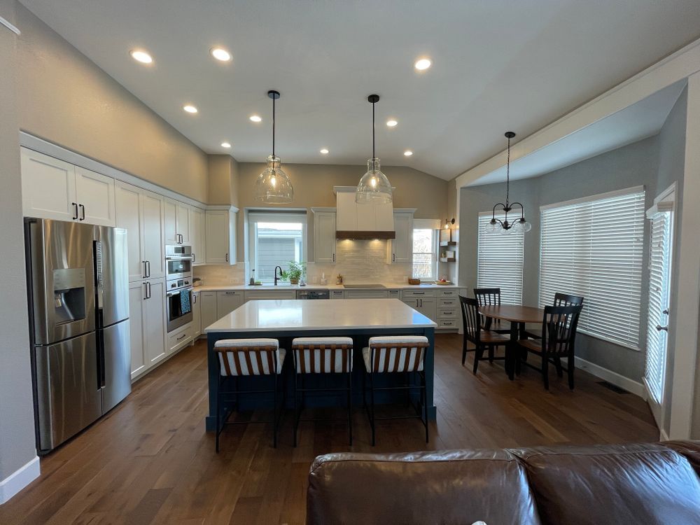 There is a large island in the middle of the kitchen.