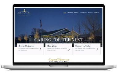 Laptop displaying a blue nonprofit website homepage with the headline “Caring for the Next”