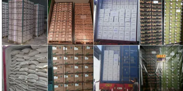 Contenedores y bolsas industriales apilados en un almacén, con filas de recipientes etiquetados en varios colores.
