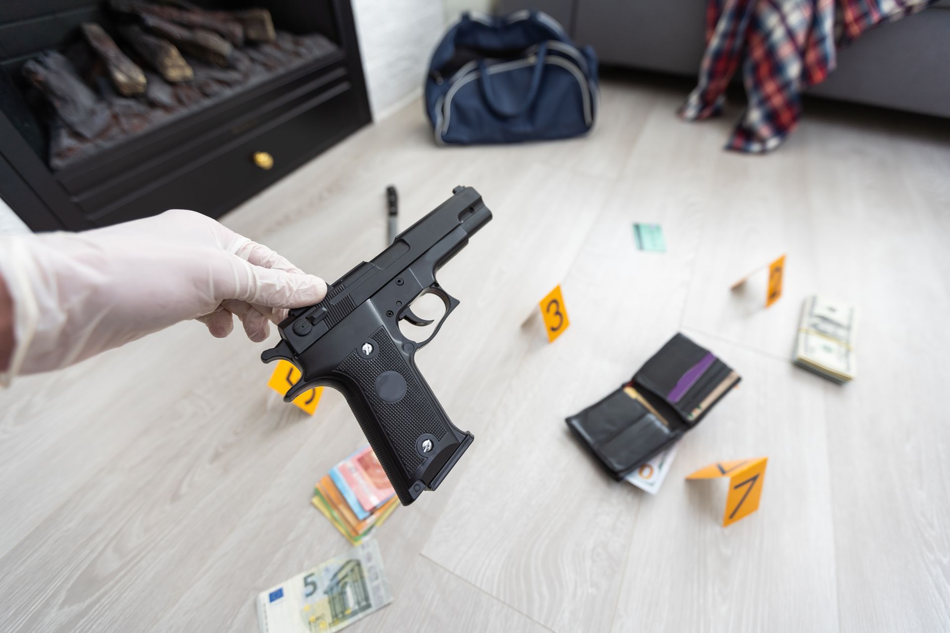 Detective in gloves looking at evidence