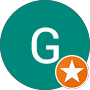 Green circular icon with a white “G” and a small orange badge with a white star in the corner