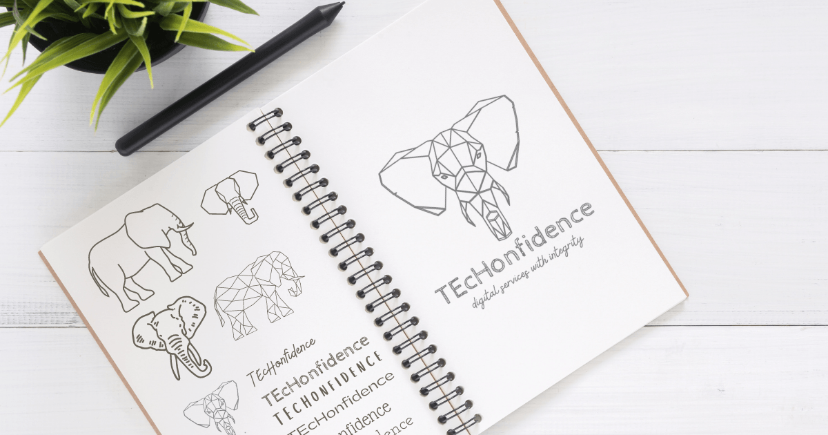 Notebook with sketches of potential logo ideas for TEcHonfidence, including several elephants