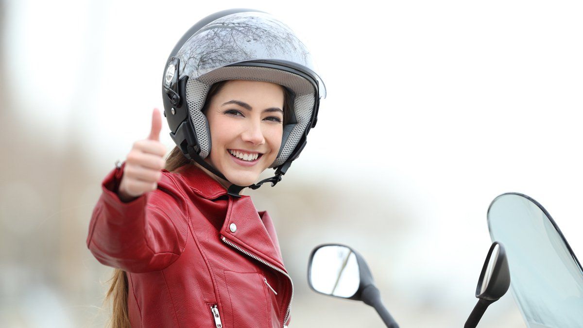 Beautiful Lady With Helmet — Charlotte, NC — Next Wave Tax Services Beautiful Lady With Helmet — Charlotte, NC — Next Wave Tax Services