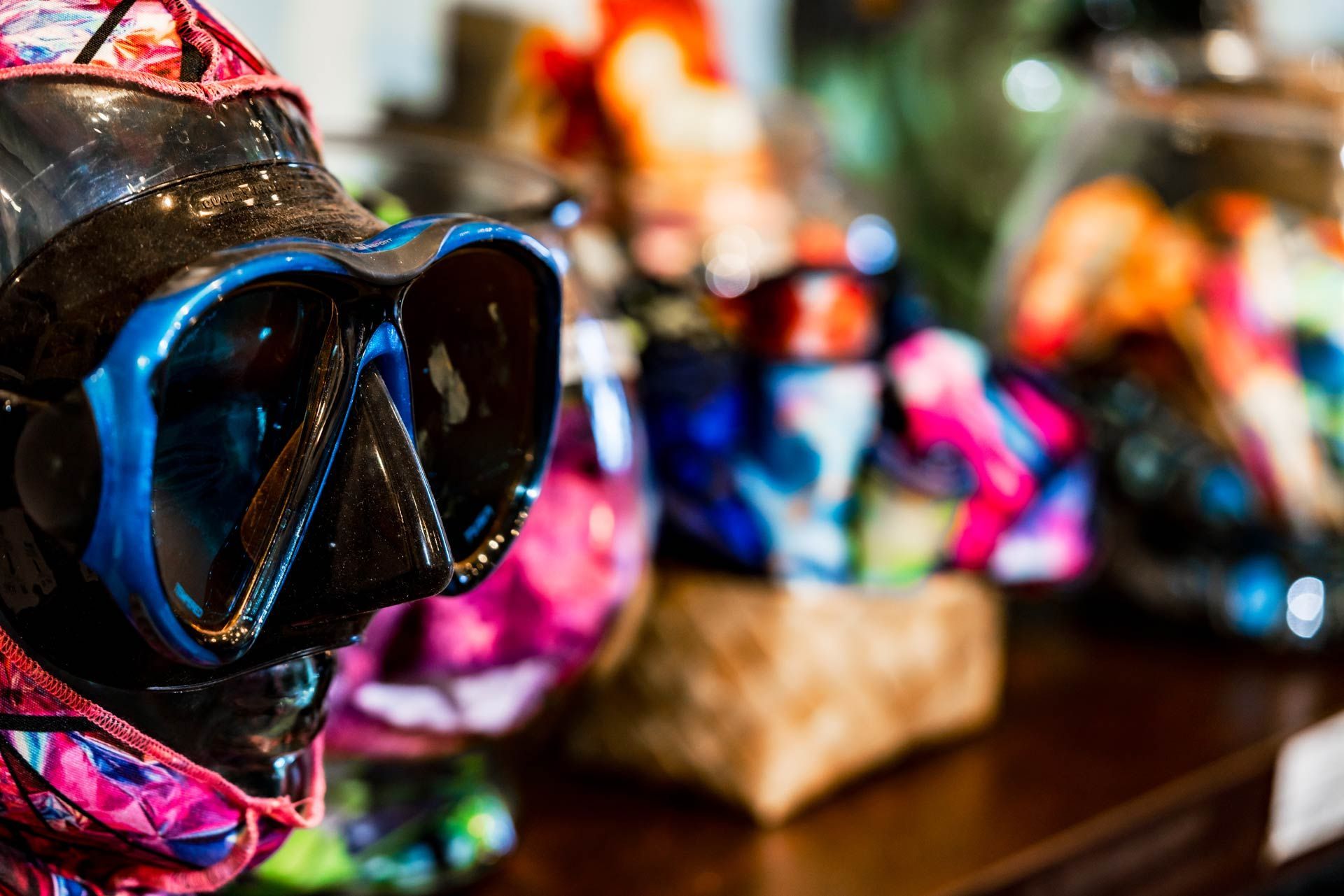 A close up of a mask on a mannequin on a table.