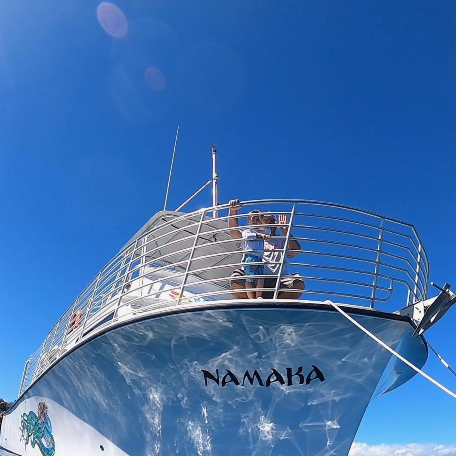 The name namaha is on the side of a boat