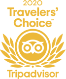 The travelers choice tripadvisor logo is yellow and has an owl and laurel wreath.