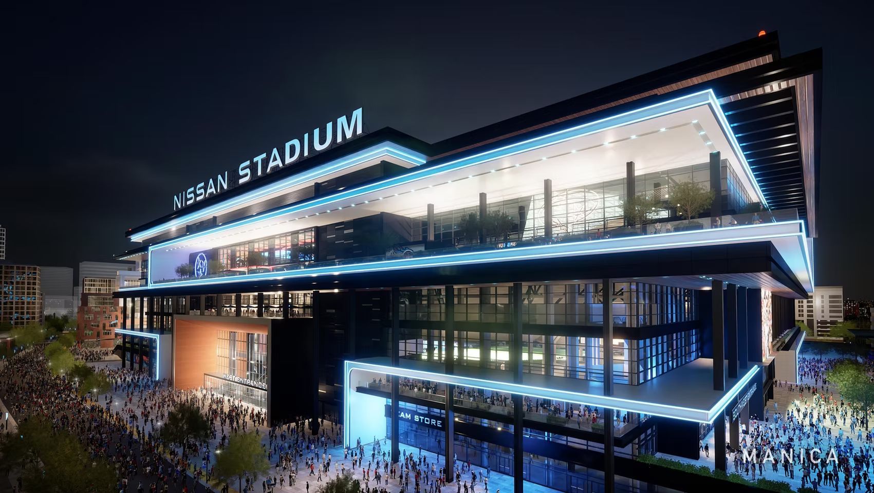 Night view of a brightly lit modern stadium with crowds outside and “MBS Stadium” sign visible