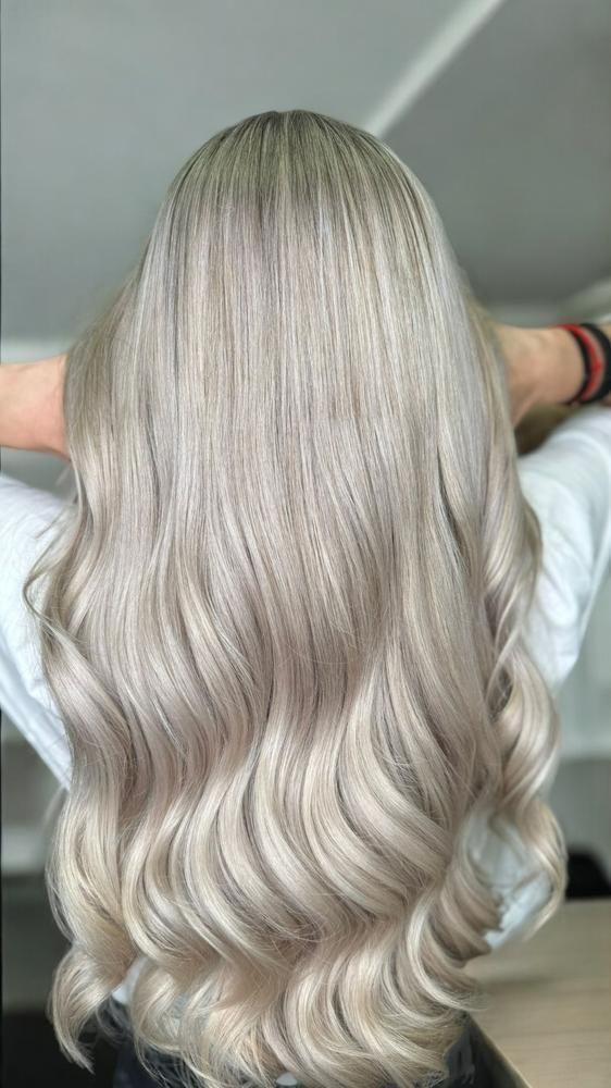 The Back of A Woman's Head with Long Blonde Hair — Main Hair Design in Armidale, NSW