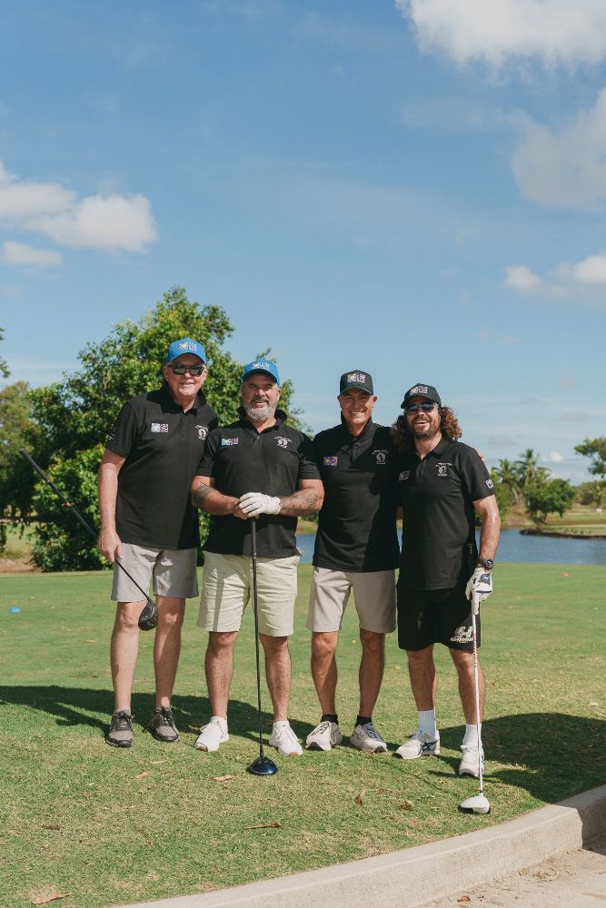 A group of men are posing for a picture on a golf course— Rowes Bay Golf Club In Rowes Bay, QLD