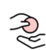A hand is holding a pink ball in its palm.