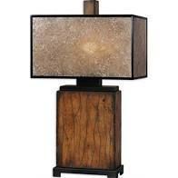 Modern table lamp with a rectangular beige shade and wooden base on a dark stand
