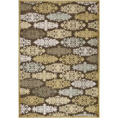 Brown and beige patterned rug with repeating floral motifs and a decorative border