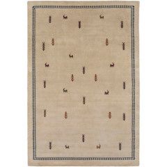 Beige patterned rug with scattered small brown and black motifs and a dark border