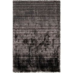 Dark gray textured rug with abstract black pattern on a white background