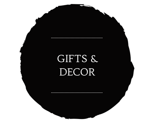 Black circular logo with white text reading “GIFTS & DECOR” and thin divider lines.