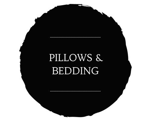 Black circular logo with white text reading “PILLOWS & BEDDING”