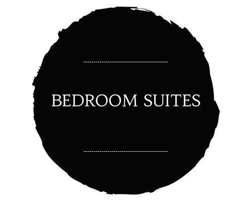 Black circular sign with white text reading “BEDROOM SUITES”