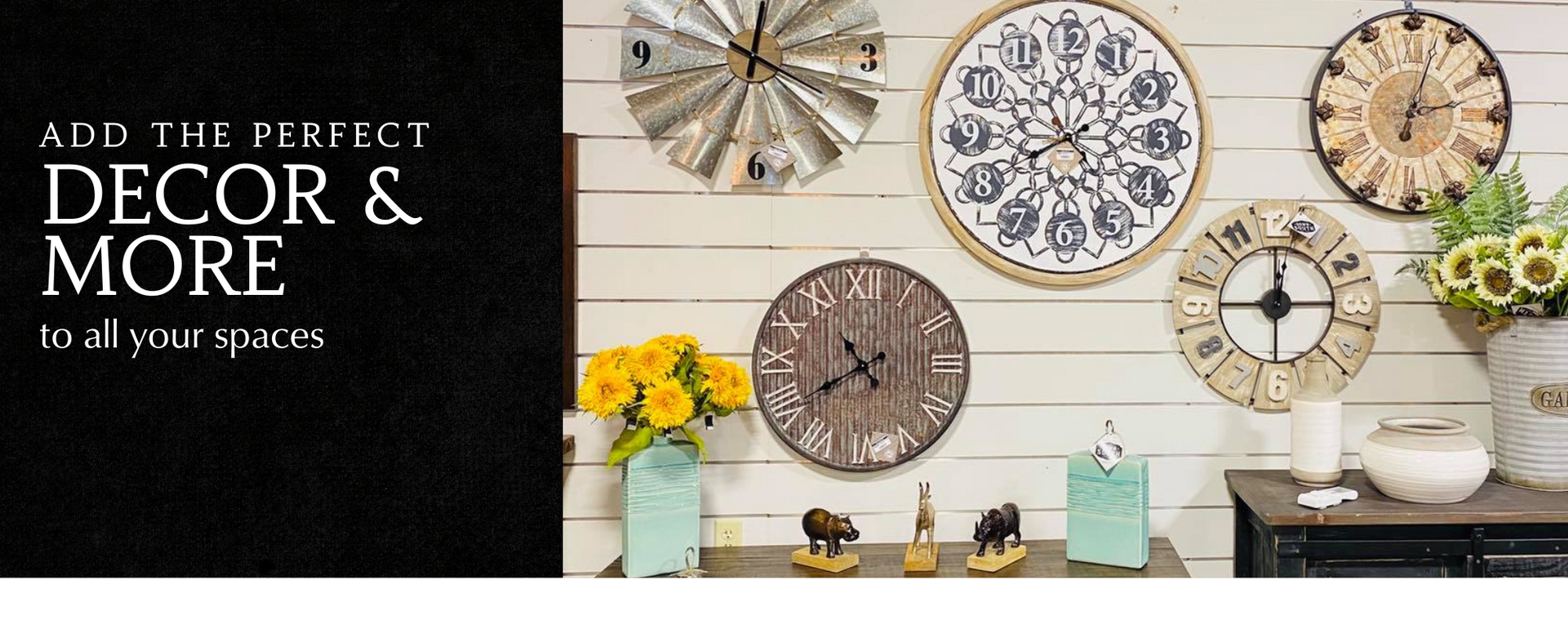 Wall decor display with four rustic clocks, flowers, and kitchen items on a light brick wall