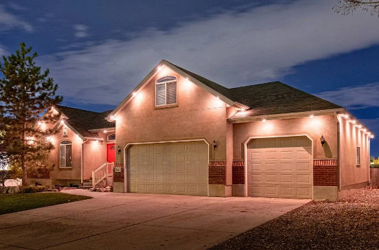 Trimlight permanent lighting illuminating porch and soffits