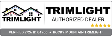 The logo for rocky mountain twilight is a rainbow colored mountain with a star in the middle.