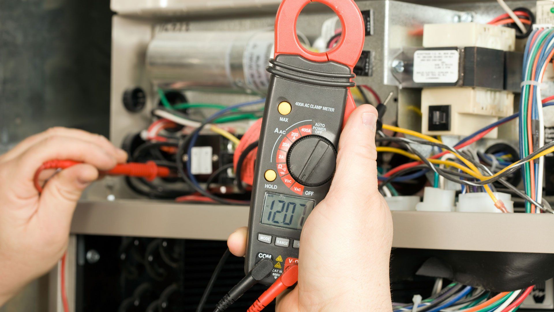 Checking the Voltage — Pueblo West, CO — Total Service Heating, Air Conditioning & Refrigeration Inc.