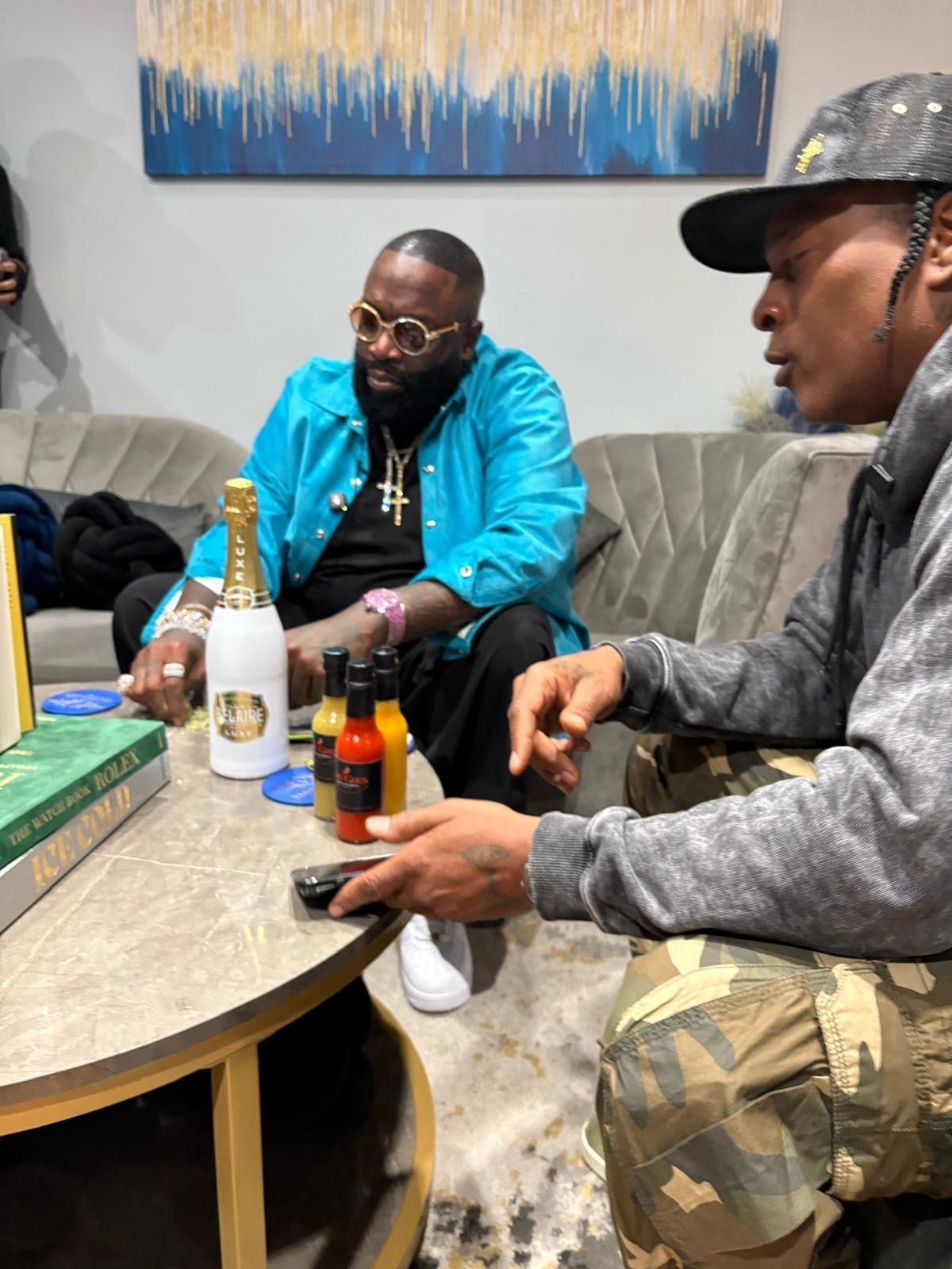 Esso and Rick Ross trying Gee Gee's Sauce