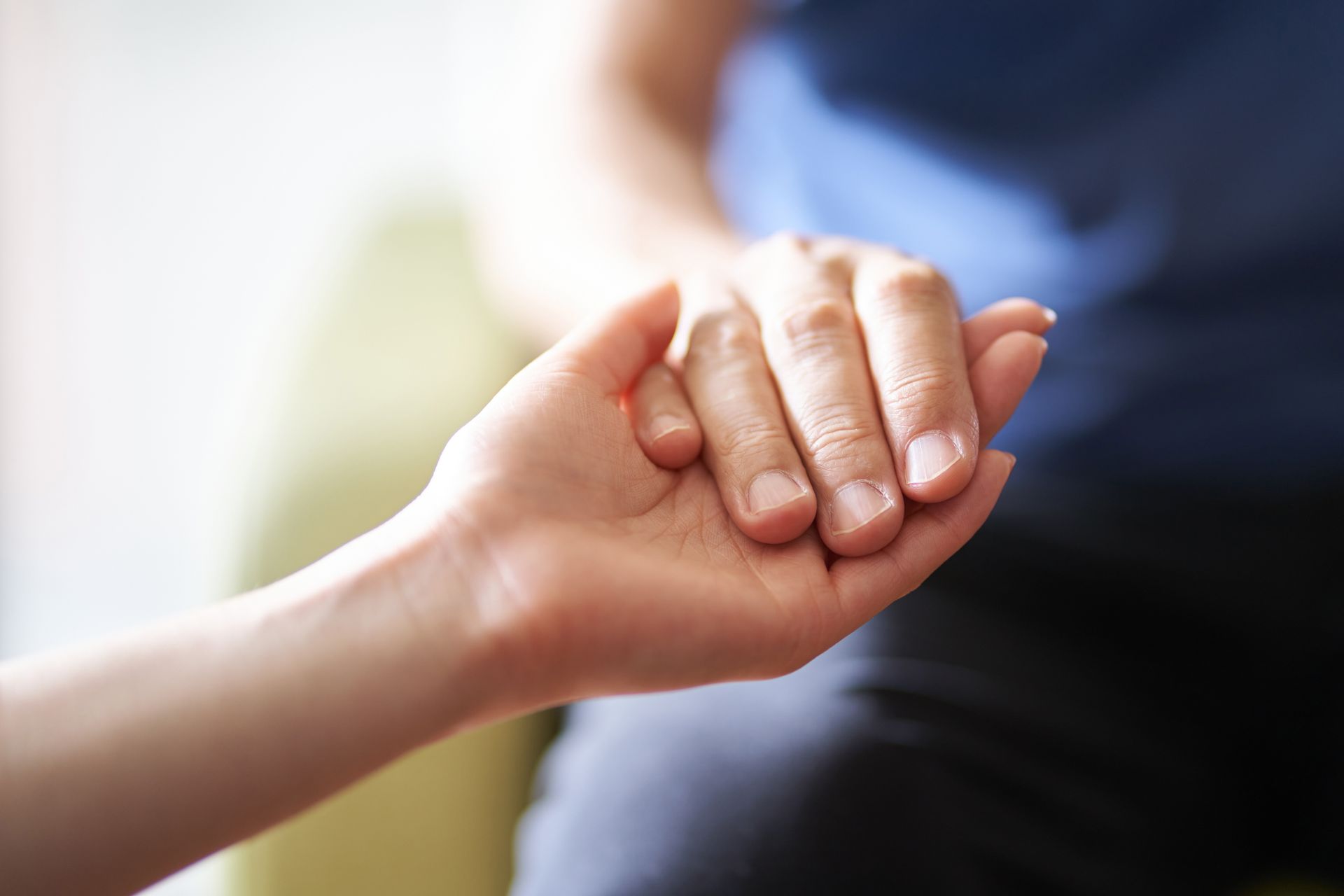 Holding the Hands of a Woman