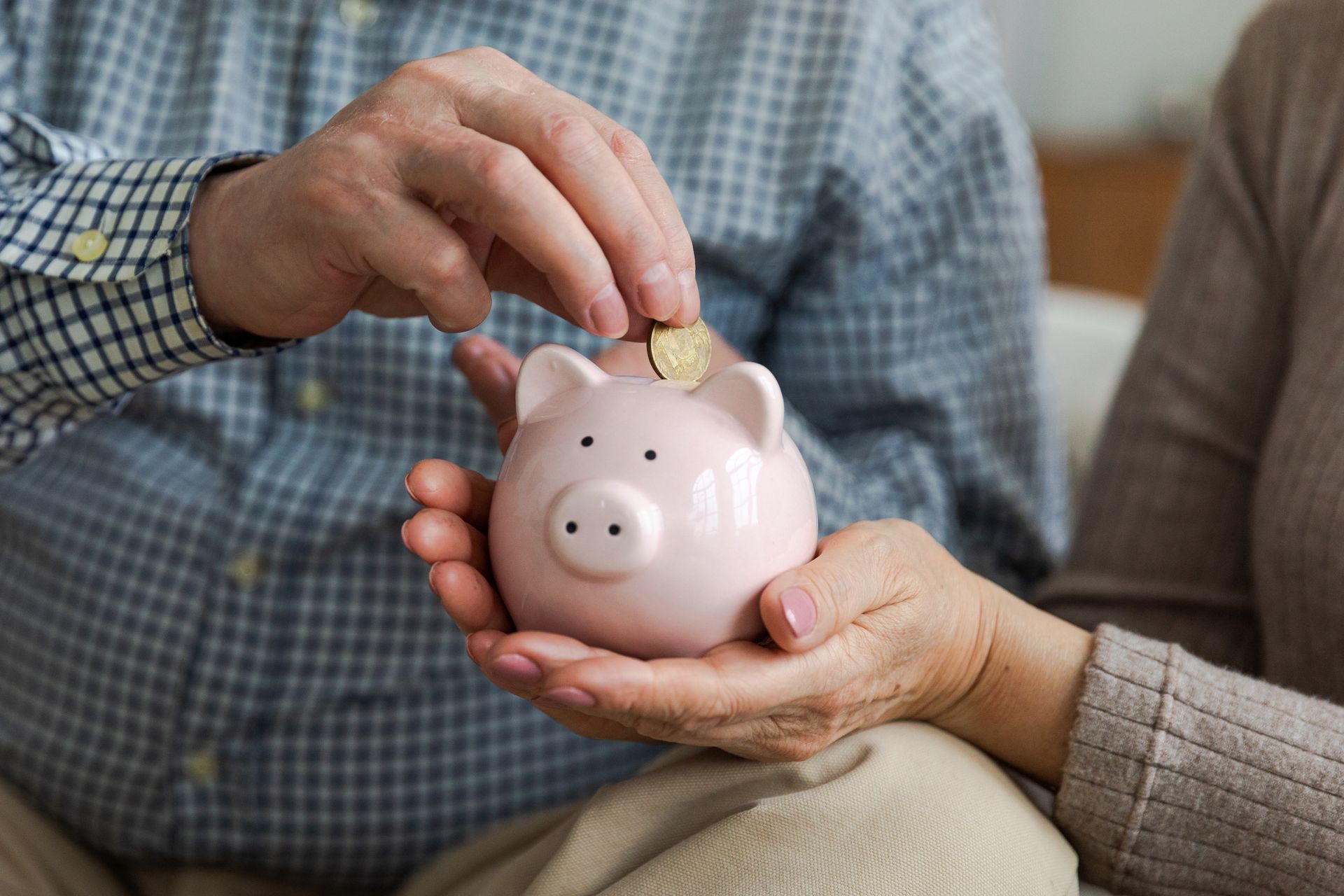 Putting Coin in a Piggy Bank