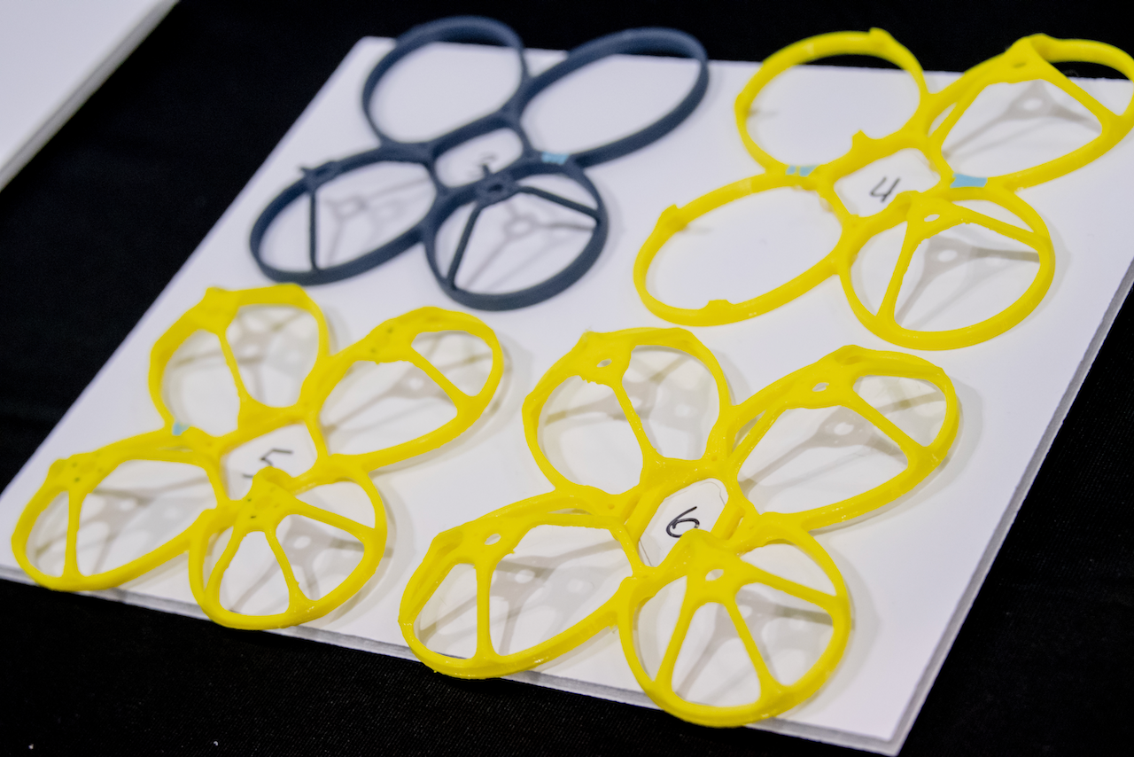 A white piece of paper with yellow and blue circles on it