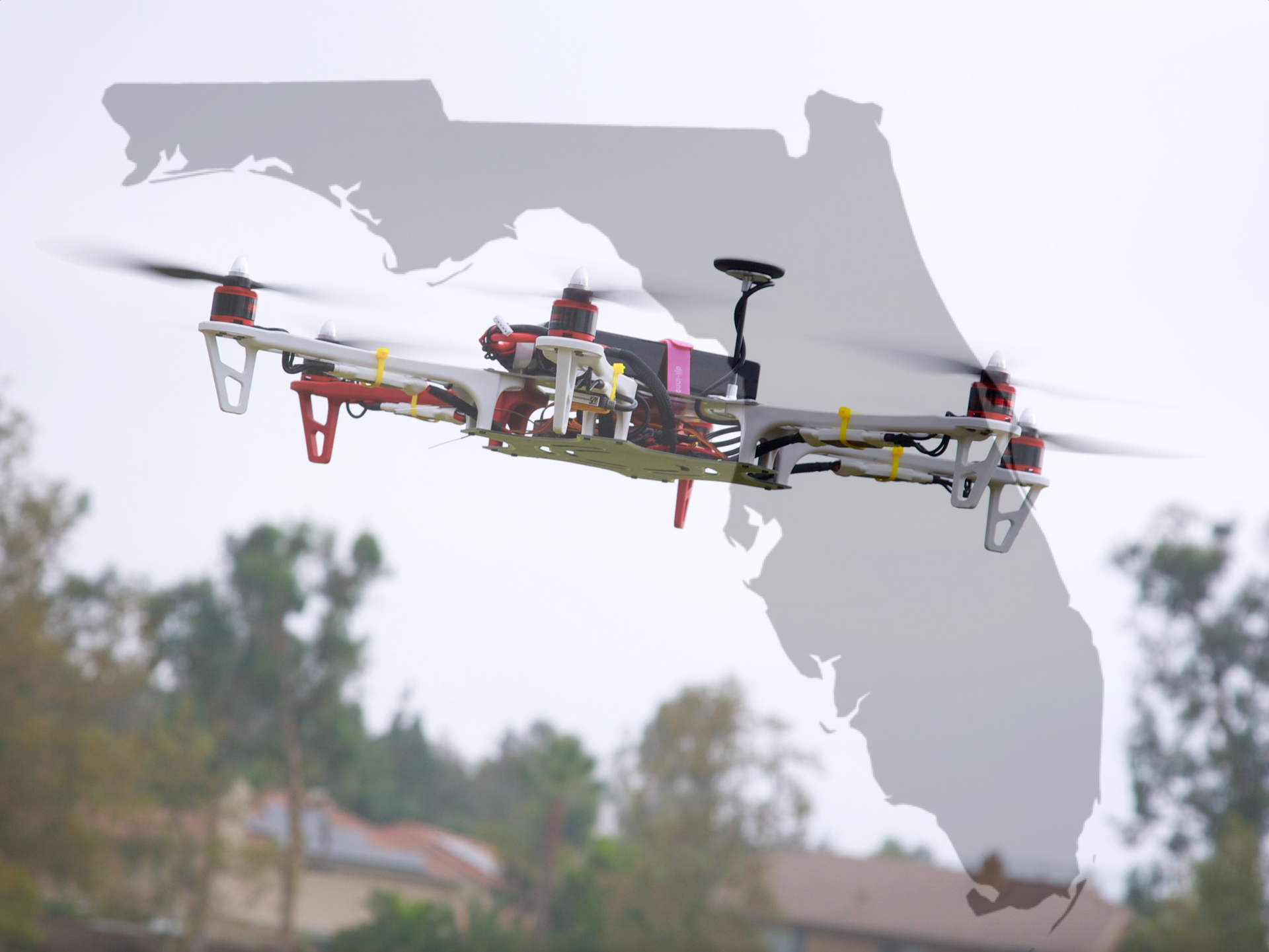 A drone is flying over a map of florida.