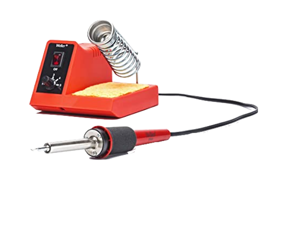 A soldering iron is sitting on top of a red stand.