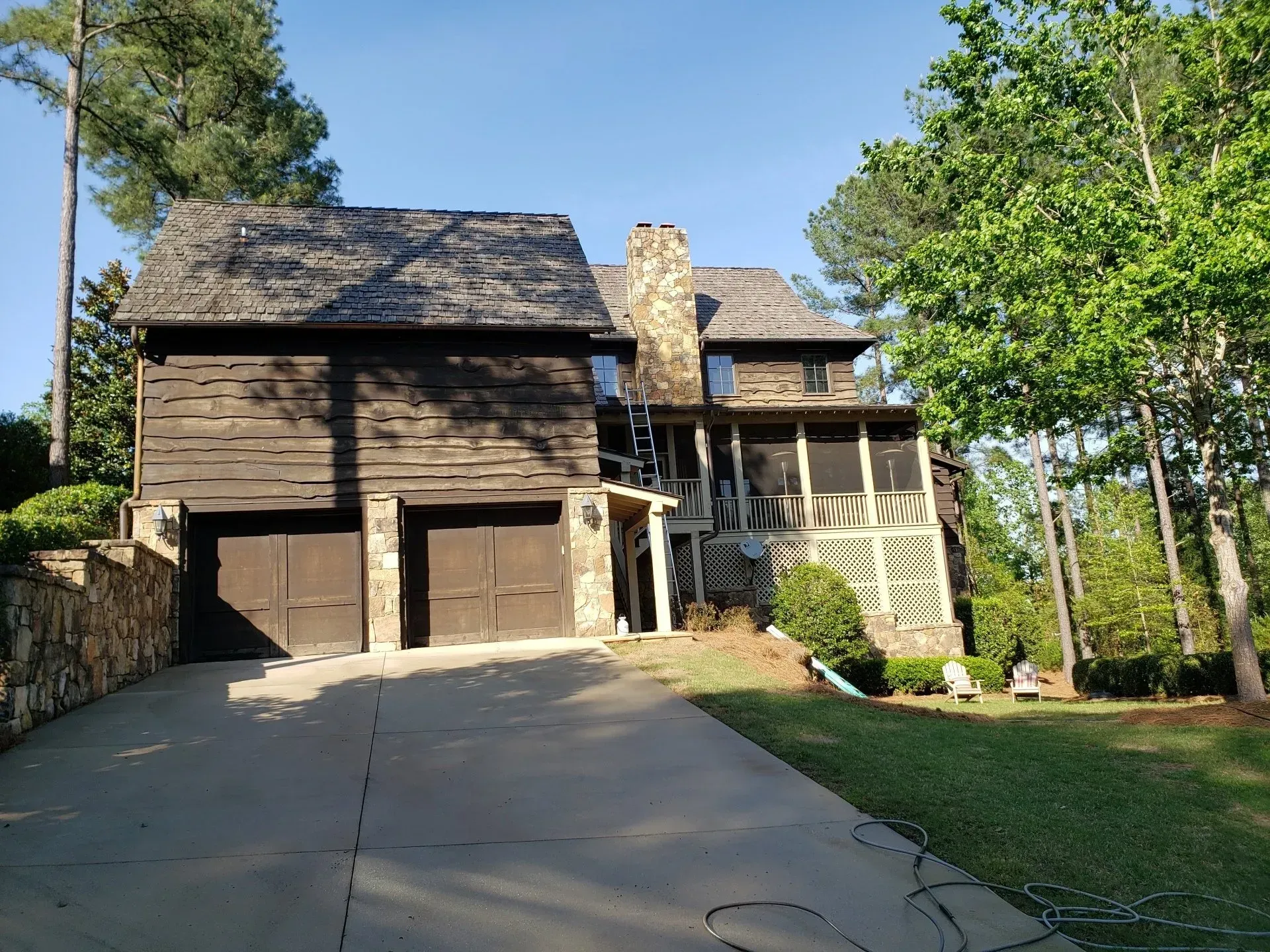 A large house with a driveway leading to it