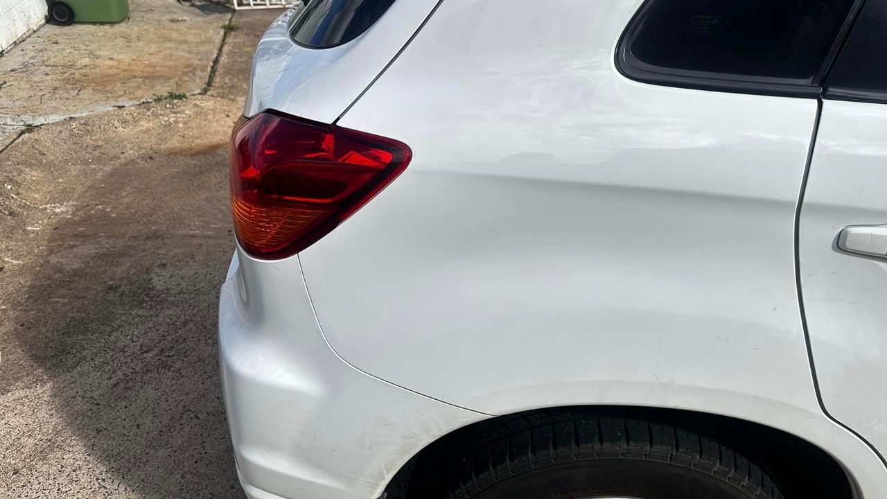 Right Side of A White Car After — Dent Repair Specialist in Kunda Park, QLD