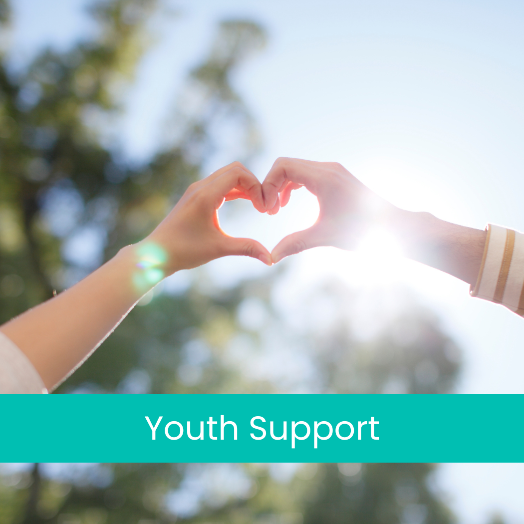Two hands form a heart shape against a sunny, blurred outdoor background, above a teal banner reading 