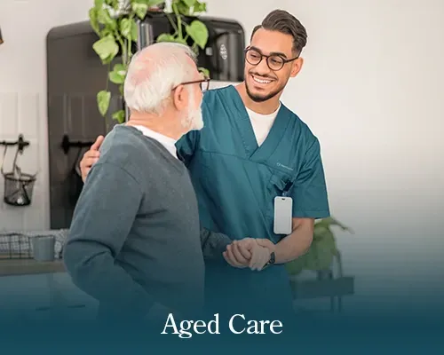 A smiling healthcare professional in a white coat.
