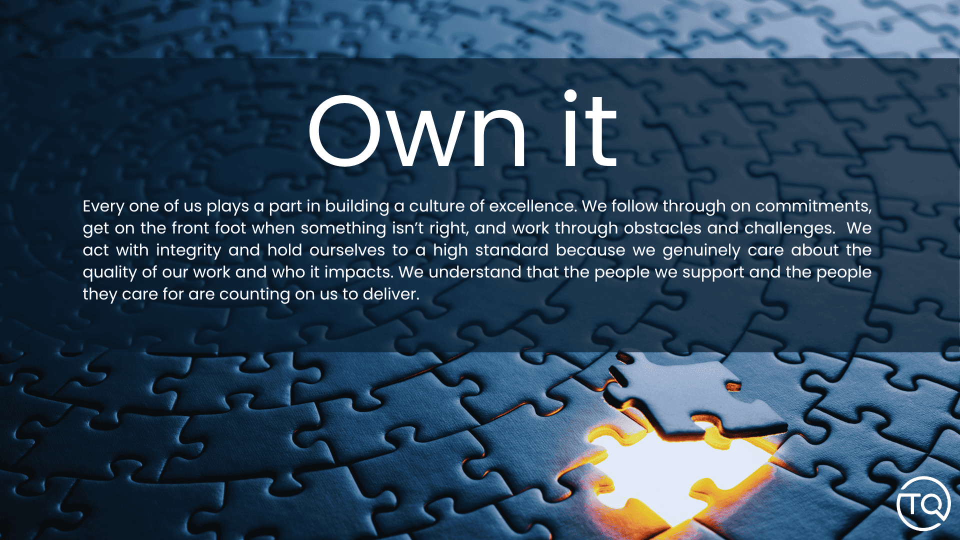 Blue puzzle pieces with one missing glowing piece and the words “Own it” above.
