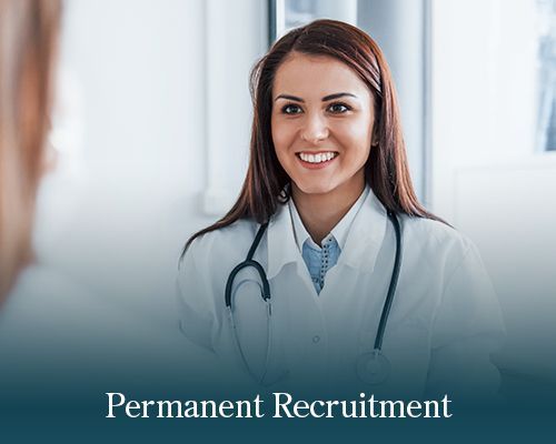 A smiling healthcare professional in a white coat.
