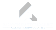 Gray geometric logo above faint text reading “CARPET HARDWOOD TILE” on a white background