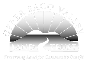 Upper Sac Valley Land Trust logo with sunrise over hills and a winding river