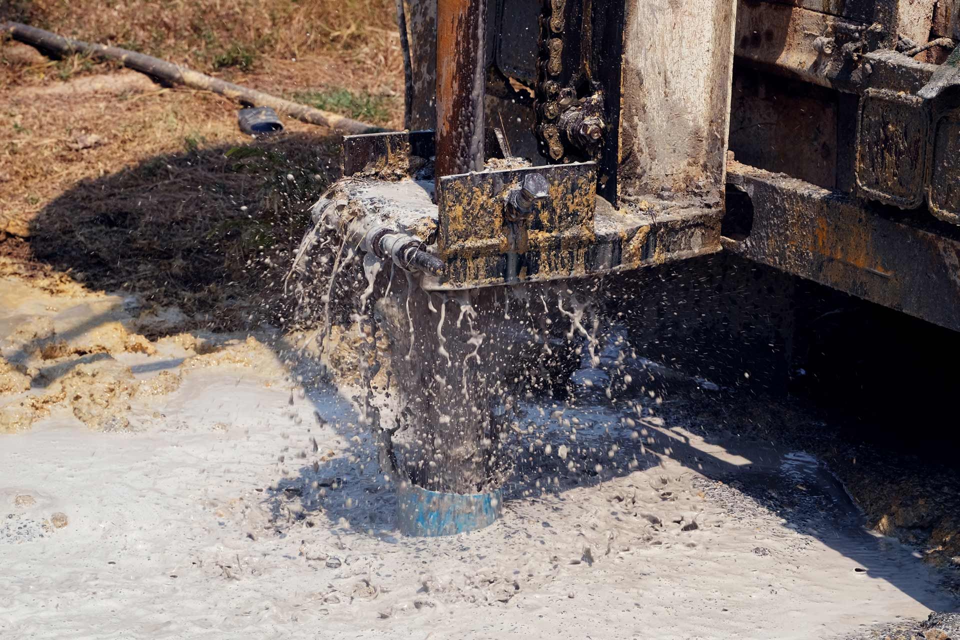 Drilling rig spraying water