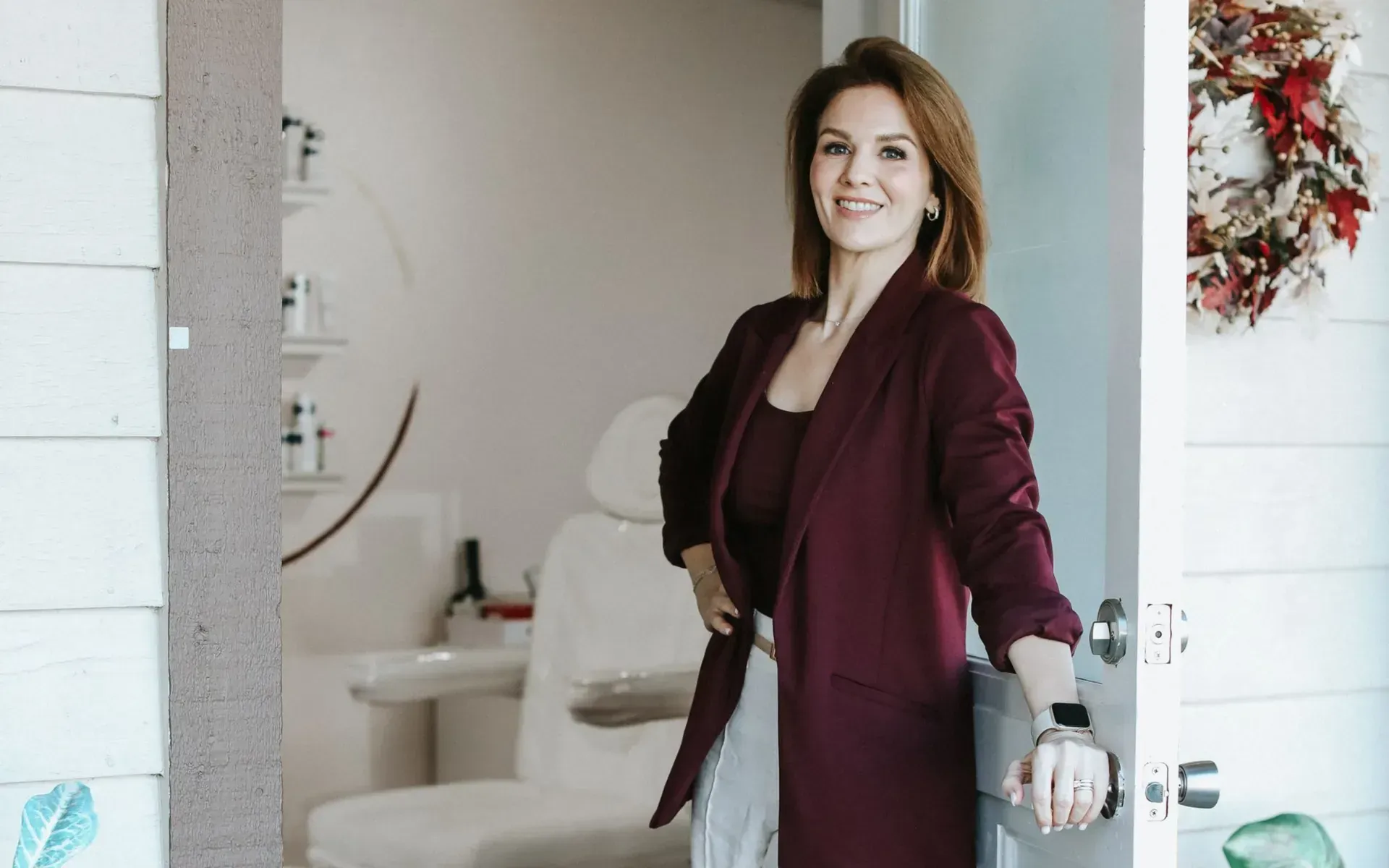Tanya Cook-Riley welcoming guests at the door of the Good Skin Aesthetics studio in Loomis